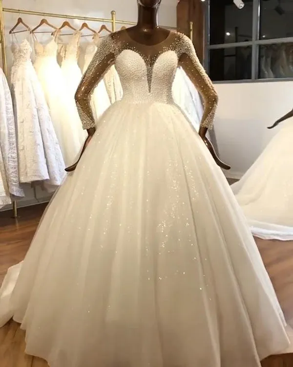 2020 Sexy Sheer Long Sleeve Wedding Gowns with Pearls Beaded Tulle Ball Gown Wedding Dress