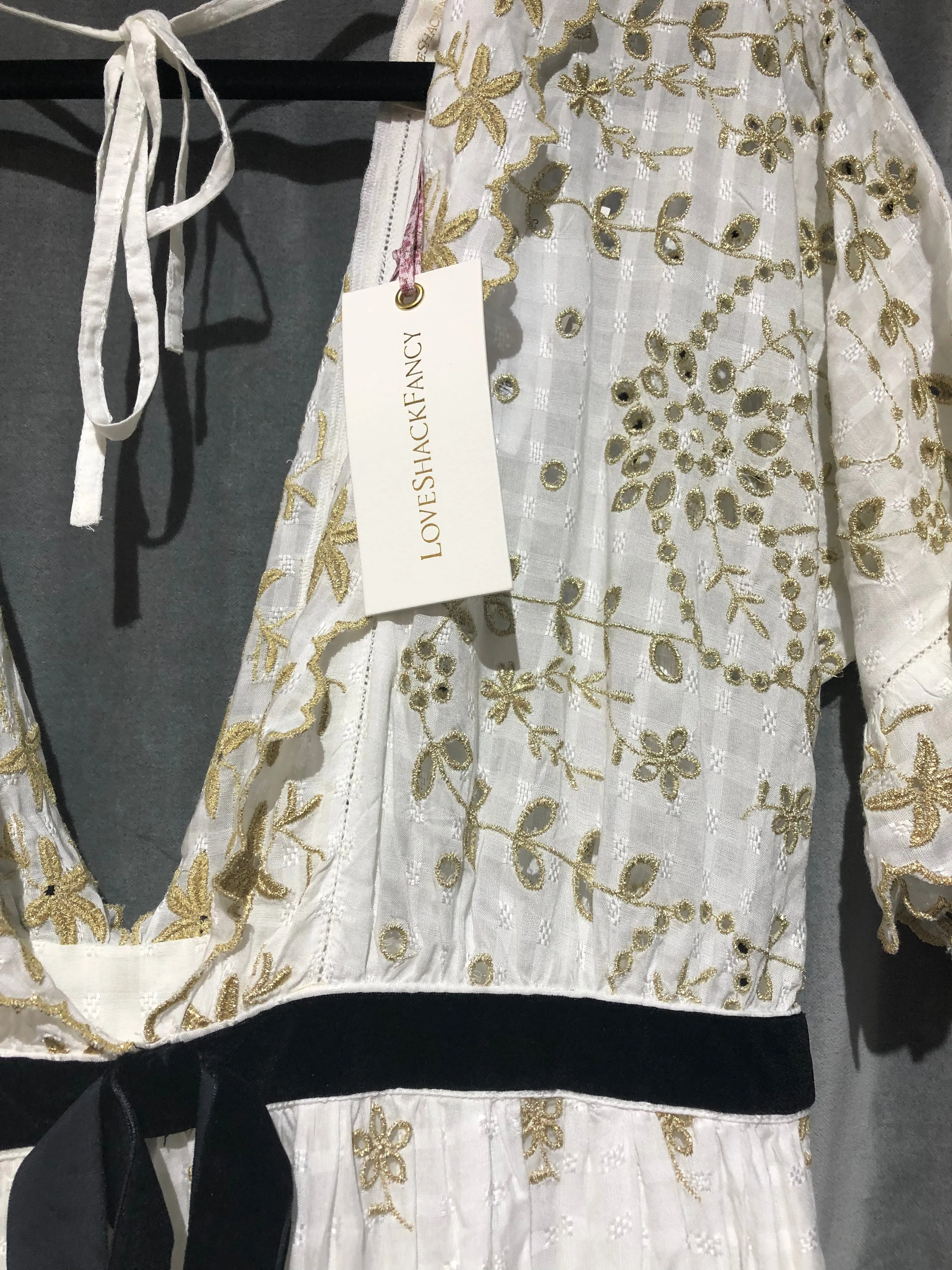 Love Shack Fancy "Augusta" White and Gold Sparkle Short Sleeve Midi Lace Dress with velvet black belt