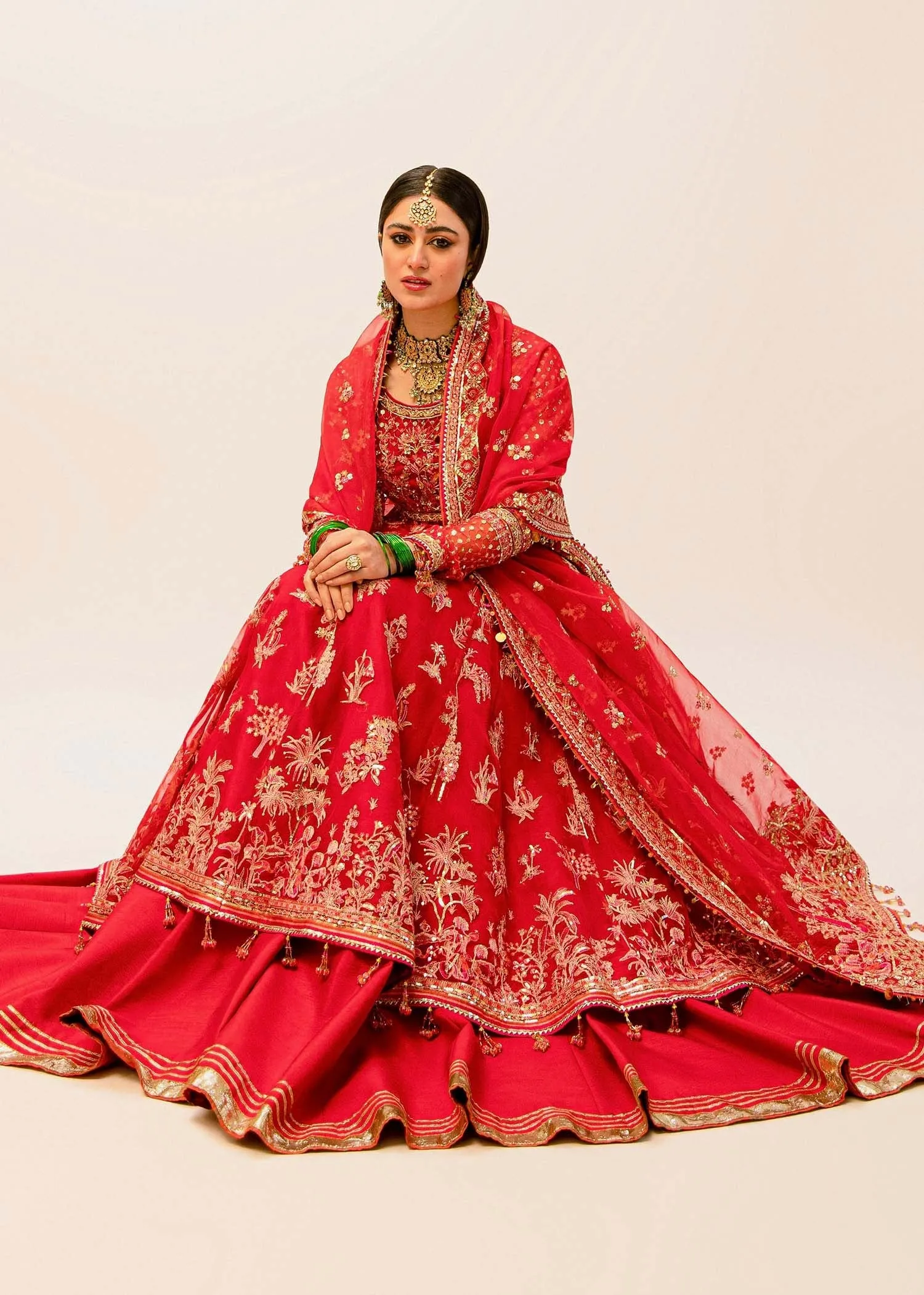 Red Pakistani Bridal Dress in Pishwas and Sharara Style